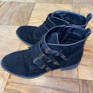 Black suede booties with metal hardware
